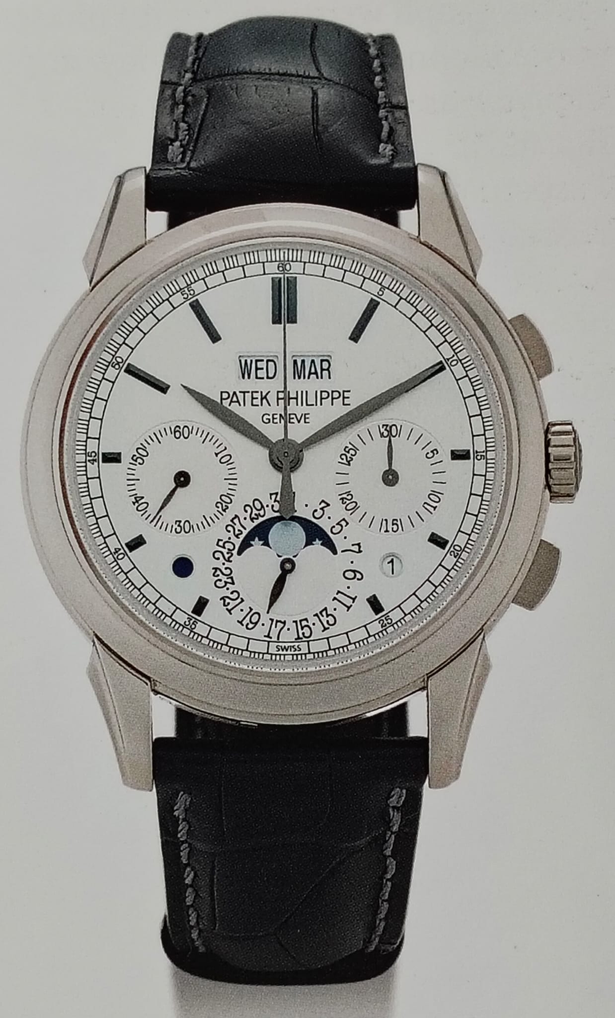 A Patek Philippe reference 5270 perpetual calendar chronograph, its day and month apertures crisply legible beneath twelve o'clock.
